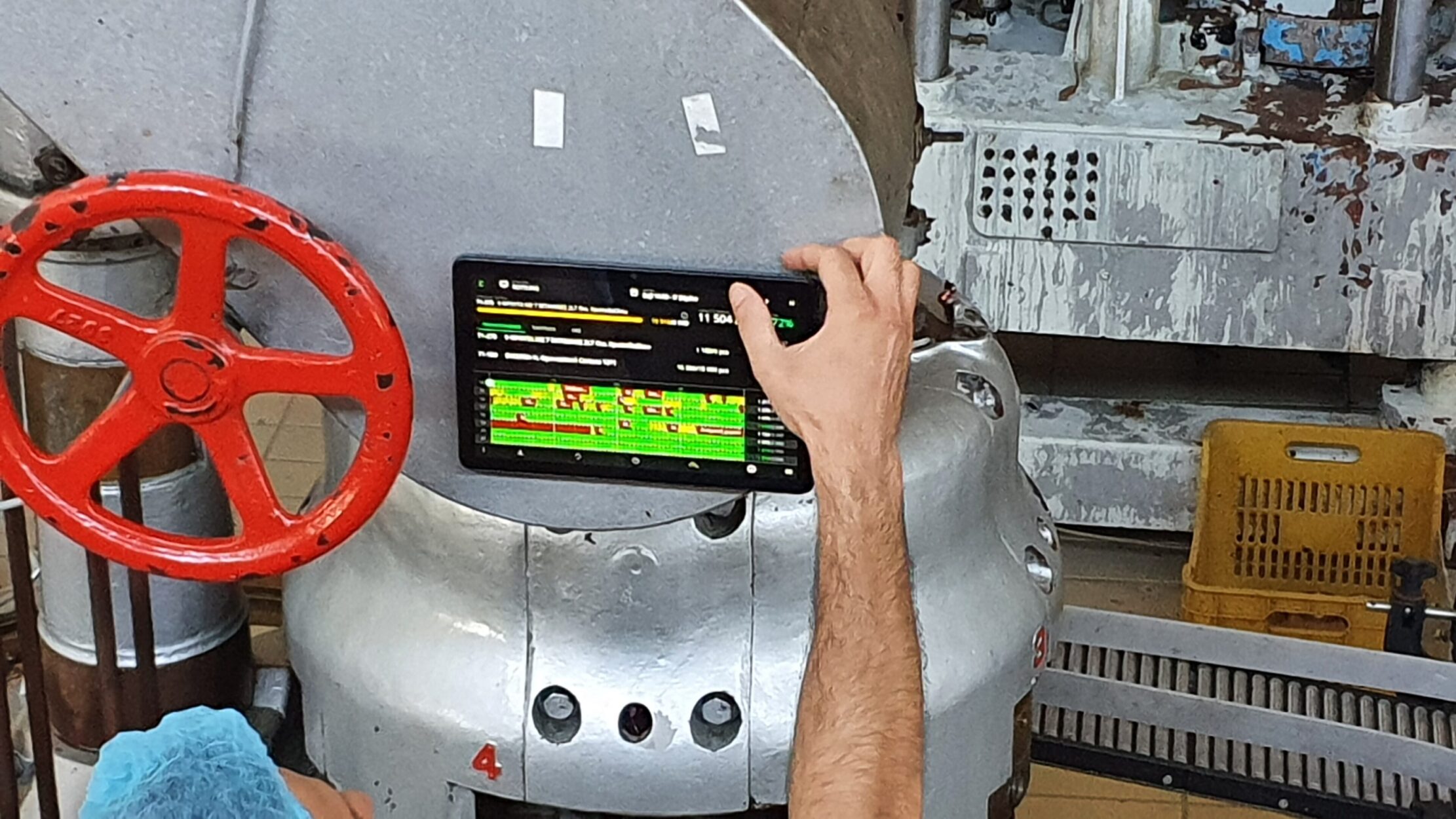 Evocon OEE software open on a tablet in a factory